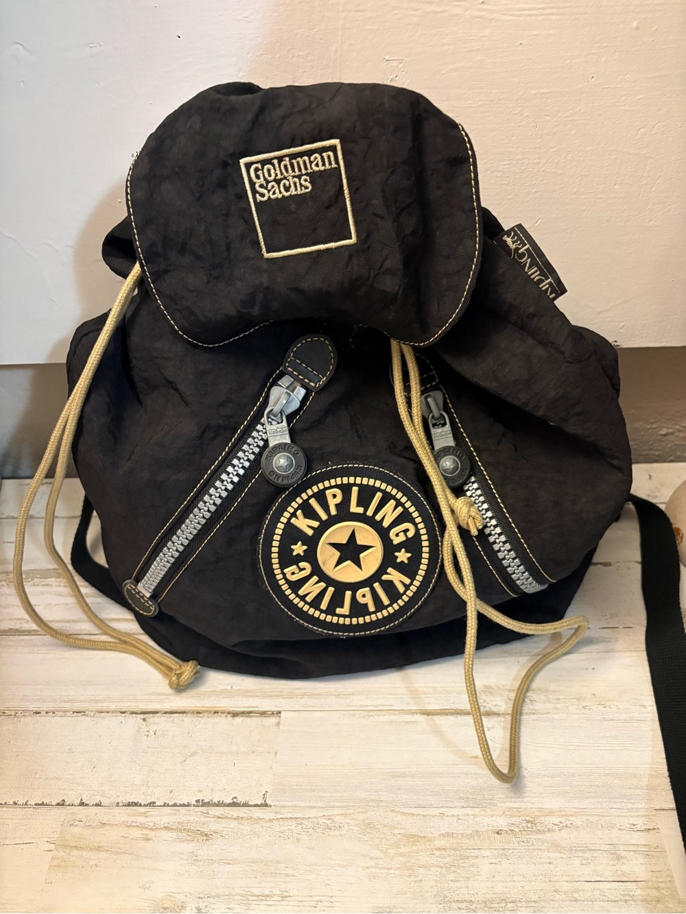 Kipling Black Backpack with Gold Accents and Goldman Sachs Patch